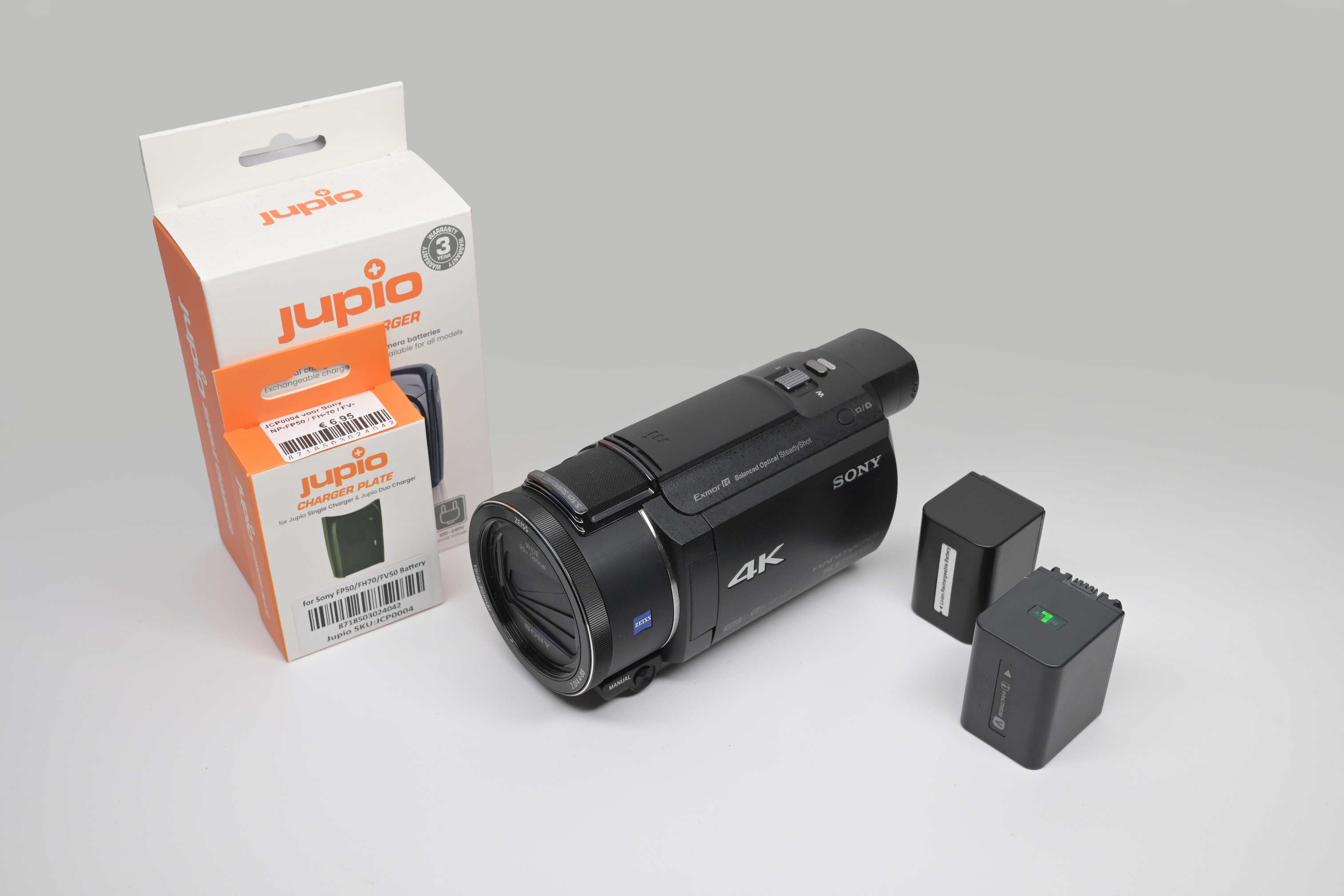 Sony FDR-AX53 4K Handycam (Occasion) + Nieuwe Jupio Lader Set *691*